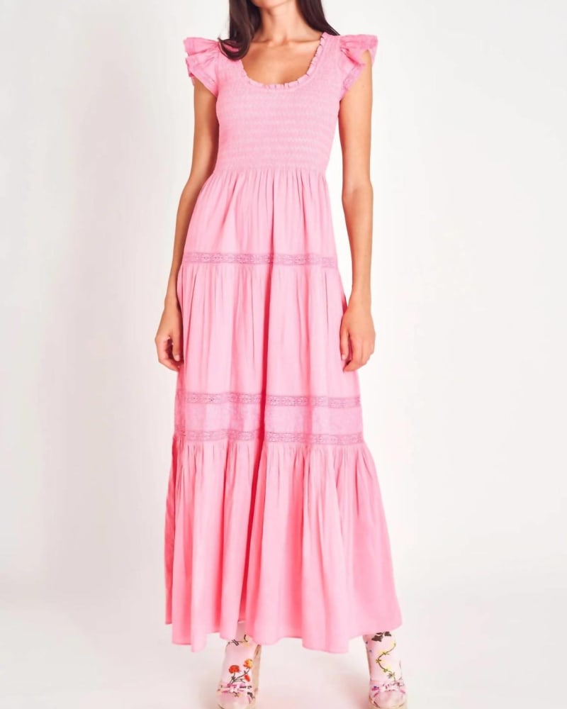 Front of a model wearing a size L Chessie Maxi Dress in Vivid Pink in Vivid Pink by LoveShackFancy. | dia_product_style_image_id:335194